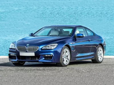 123oto THAY KÍNH XE Ô TÔ BMW 650i tận nơi